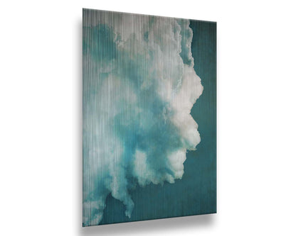 A photograph of a big white cloud with a teal background. Printed on metal.