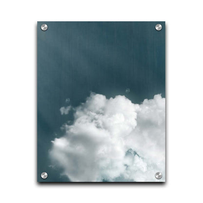 An edited photo of a soft white cloud against a steely blue background. Printed on acrylic.