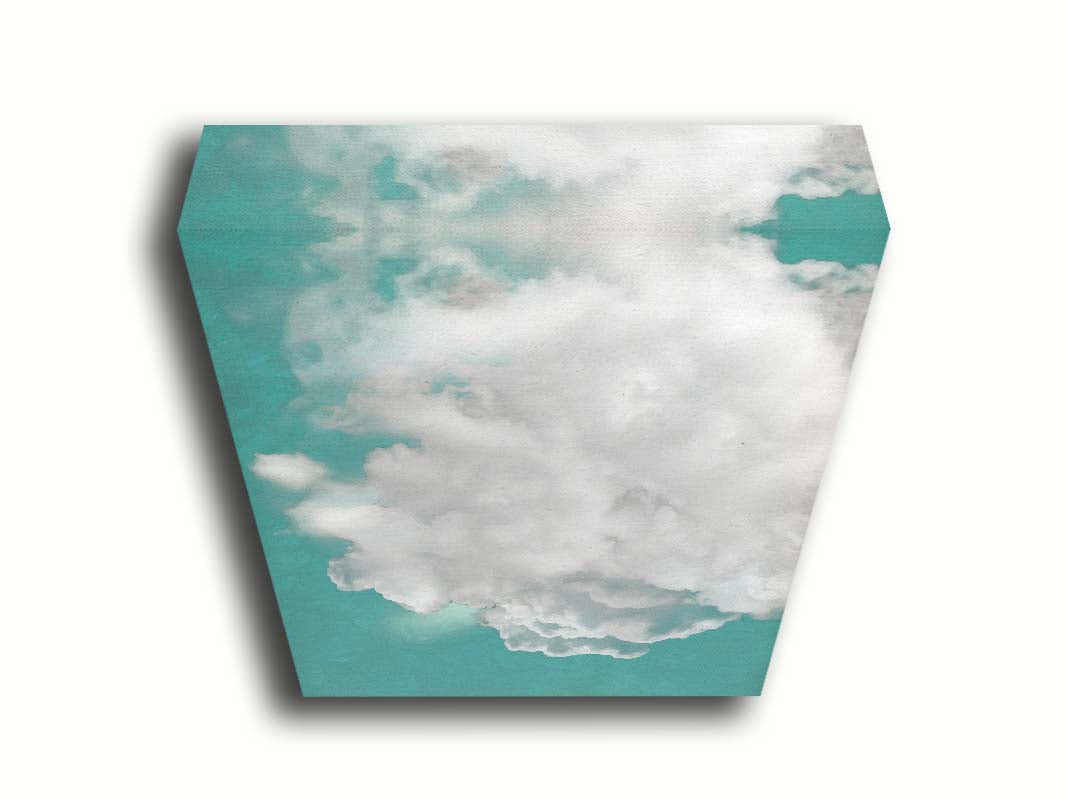 An edited photo of a soft white cloud against a turquoise blue background. Printed on canvas.