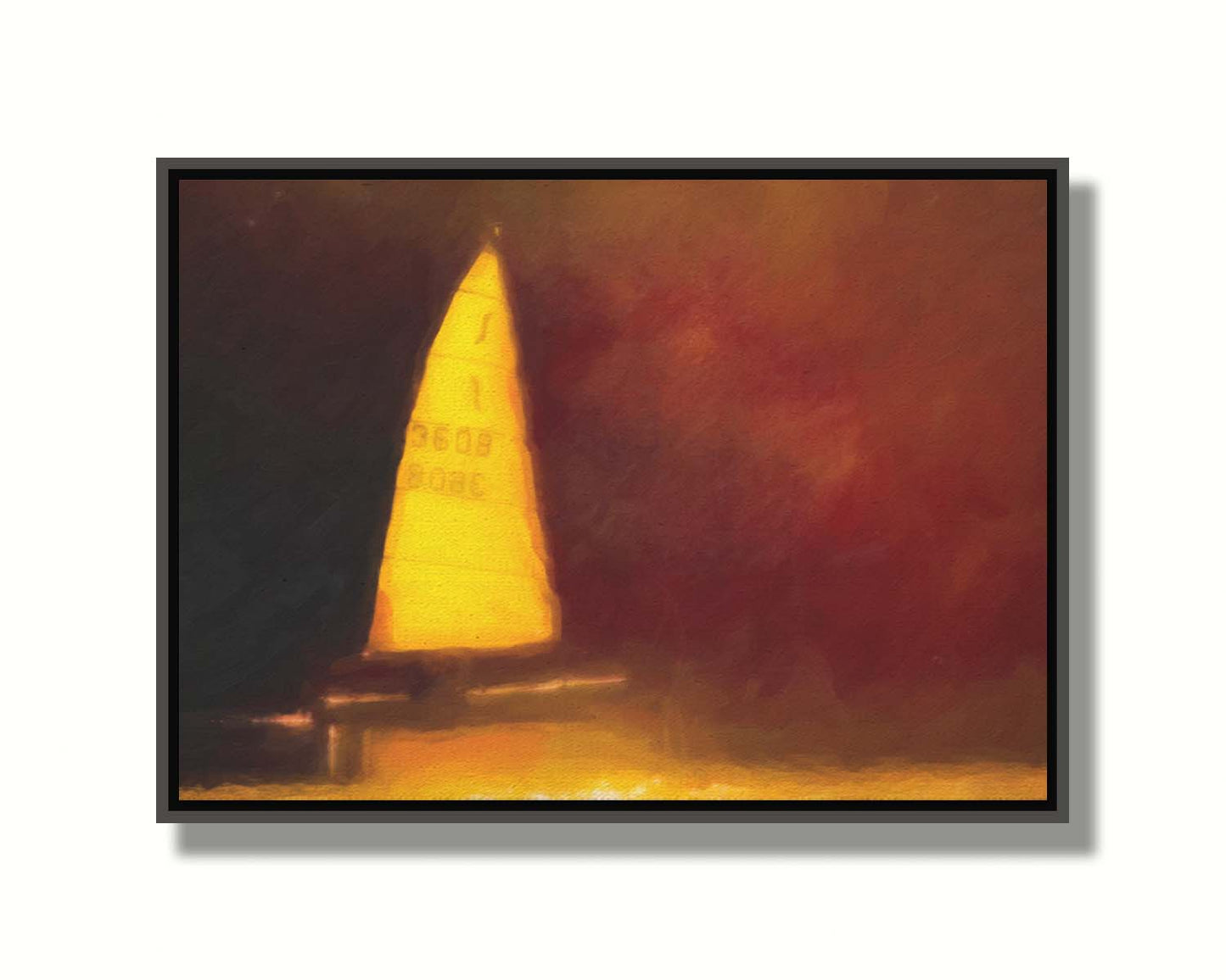 An edited photograph of a sailboat on the water, surrounded by a rusty red and bright yellow color palette, with an added painterly texture. Printed on canvas in a float frame.