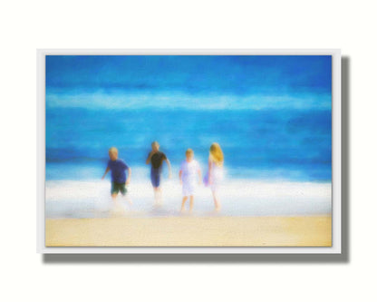 A photograph of four children walking on the beach by the water's edge. It is edited with an effect that gives it a painterly, dreamlike quality. Printed on canvas in a float frame.