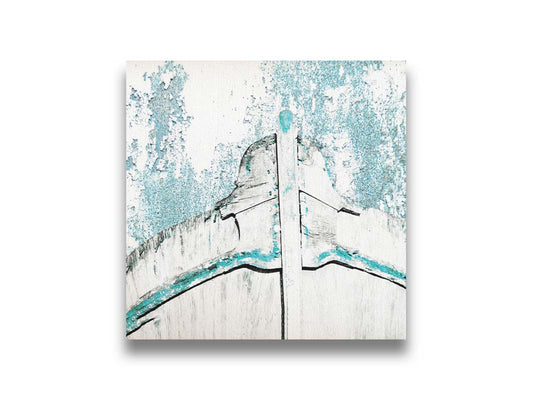 A photograph of an old boat bow in a white and turquoise palette. Printed on canvas.