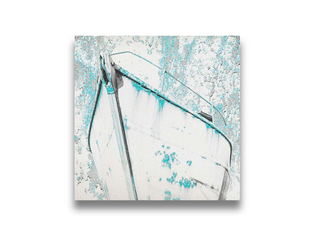 A photograph of an old boat in a white and turquoise palette. Printed on canvas.