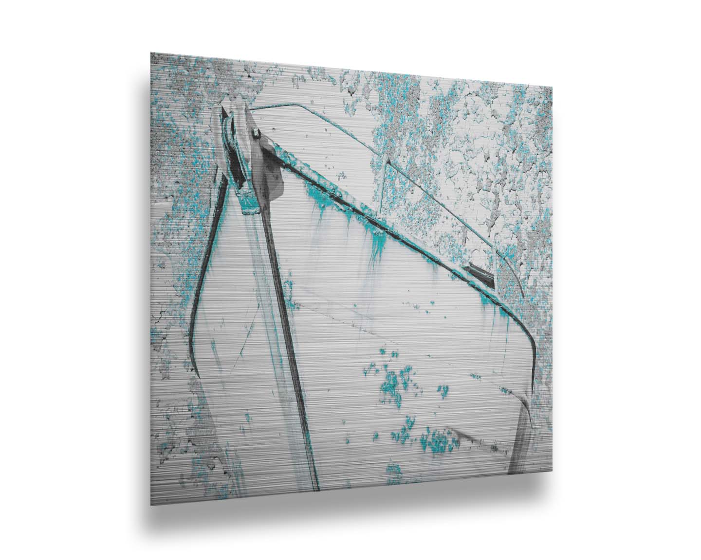 A photograph of an old boat in a white and turquoise palette. Printed on metal.