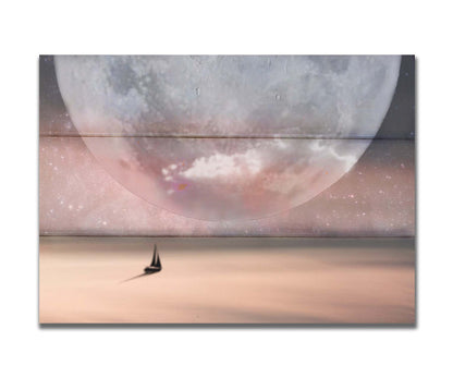 An image in pinks and grays of a sailboat crossing smooth water under a starry sky. The moon is enlarged and takes up most of the sky. Printed on a box board.