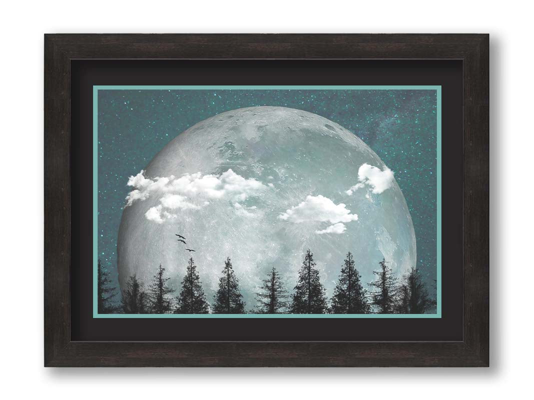 An edited collage of photos depicting an oversized moon over a silhouetted evergreen forest at night. A few clouds and bids pass across the scene. Printed on paper, matted, and framed.