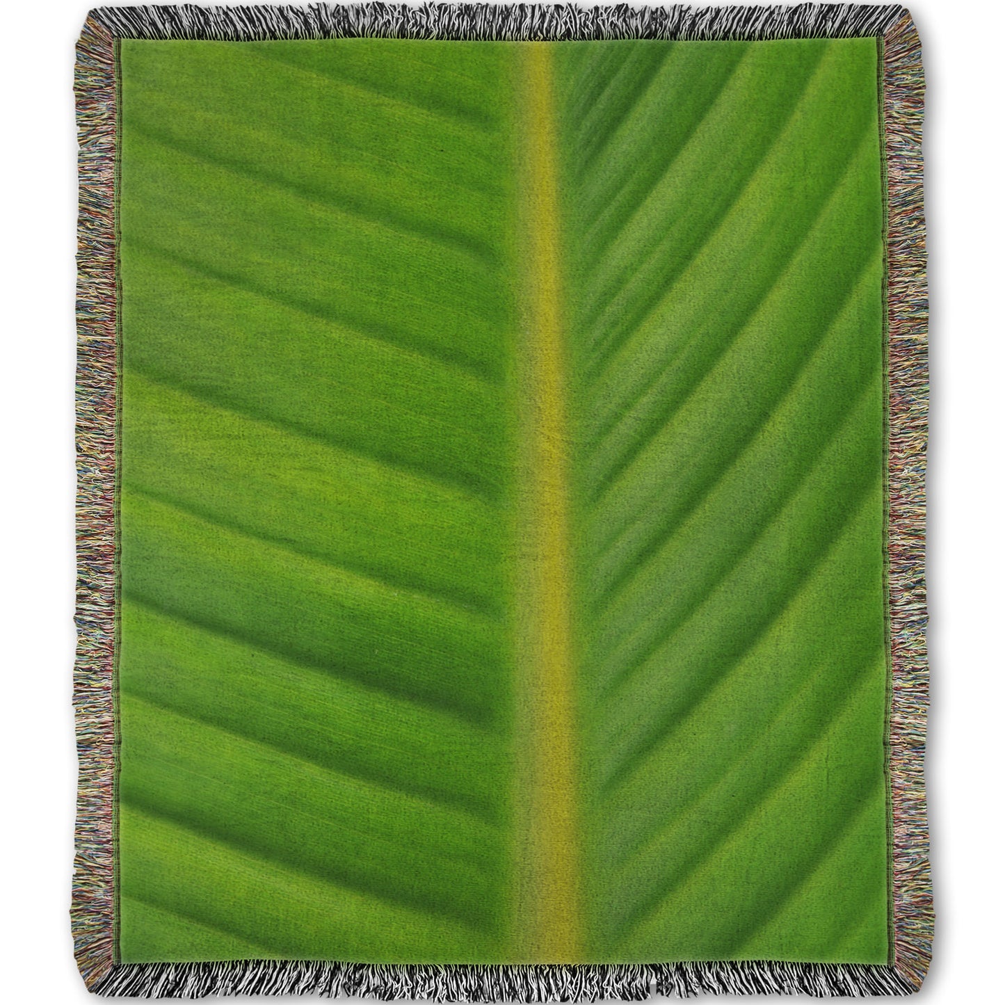 A woven throw blanket designed with a closeup photo of a bird of paradise leaf, showing all the detail of the midrib and veins of the leaf.