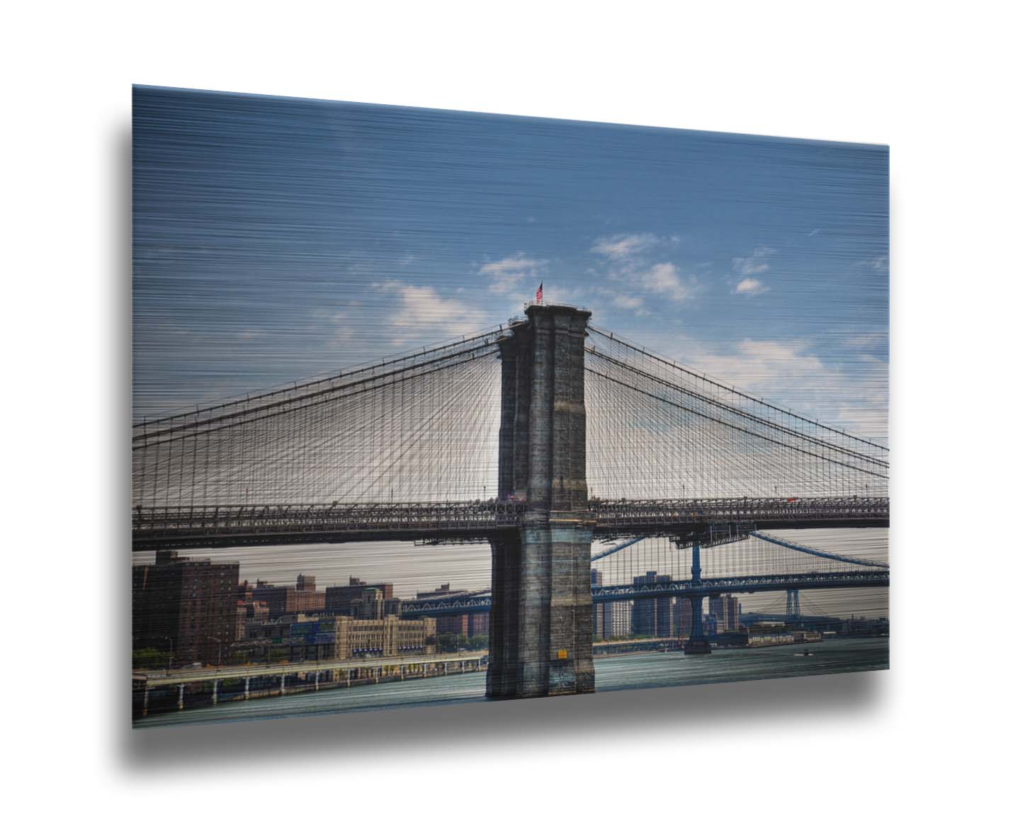 A photo of a side view of the Brooklyn Bridge against a blue sky. Printed on metal.