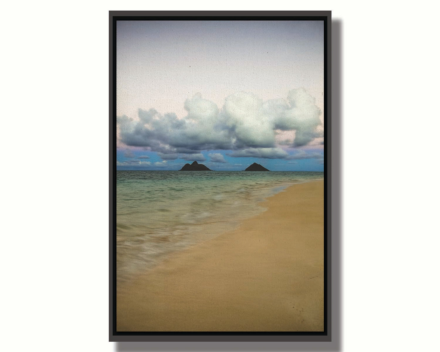 A photo of the Kaʻōhao beach, looking out at the sea. Printed on canvas in a float frame.