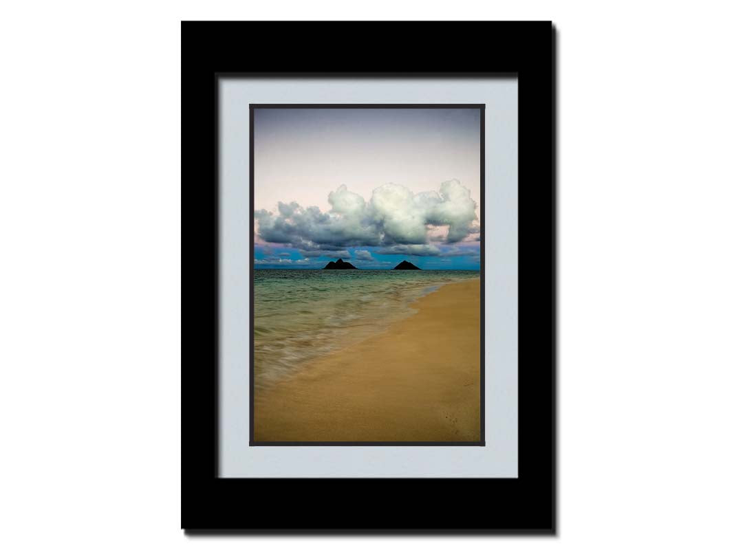 A photo of the Kaʻōhao beach, looking out at the sea. Printed on paper, matted, and framed.