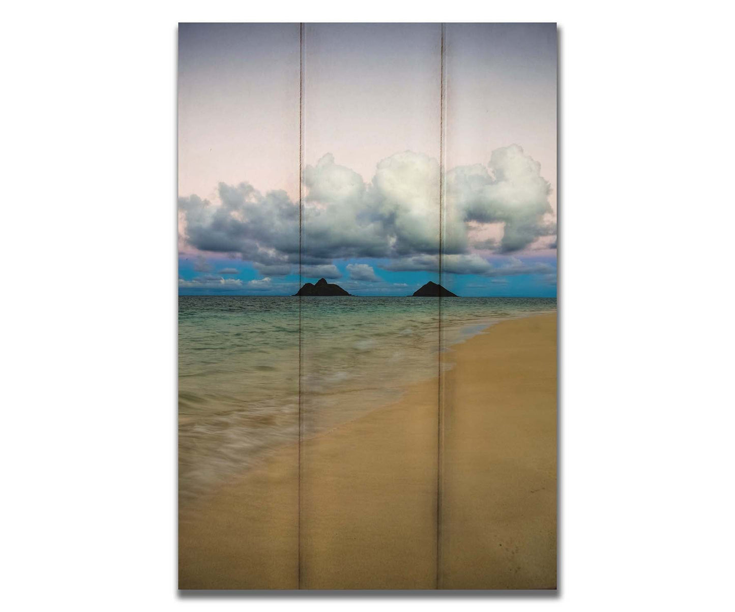 A photo of the Kaʻōhao beach, looking out at the sea. Printed on a box board.