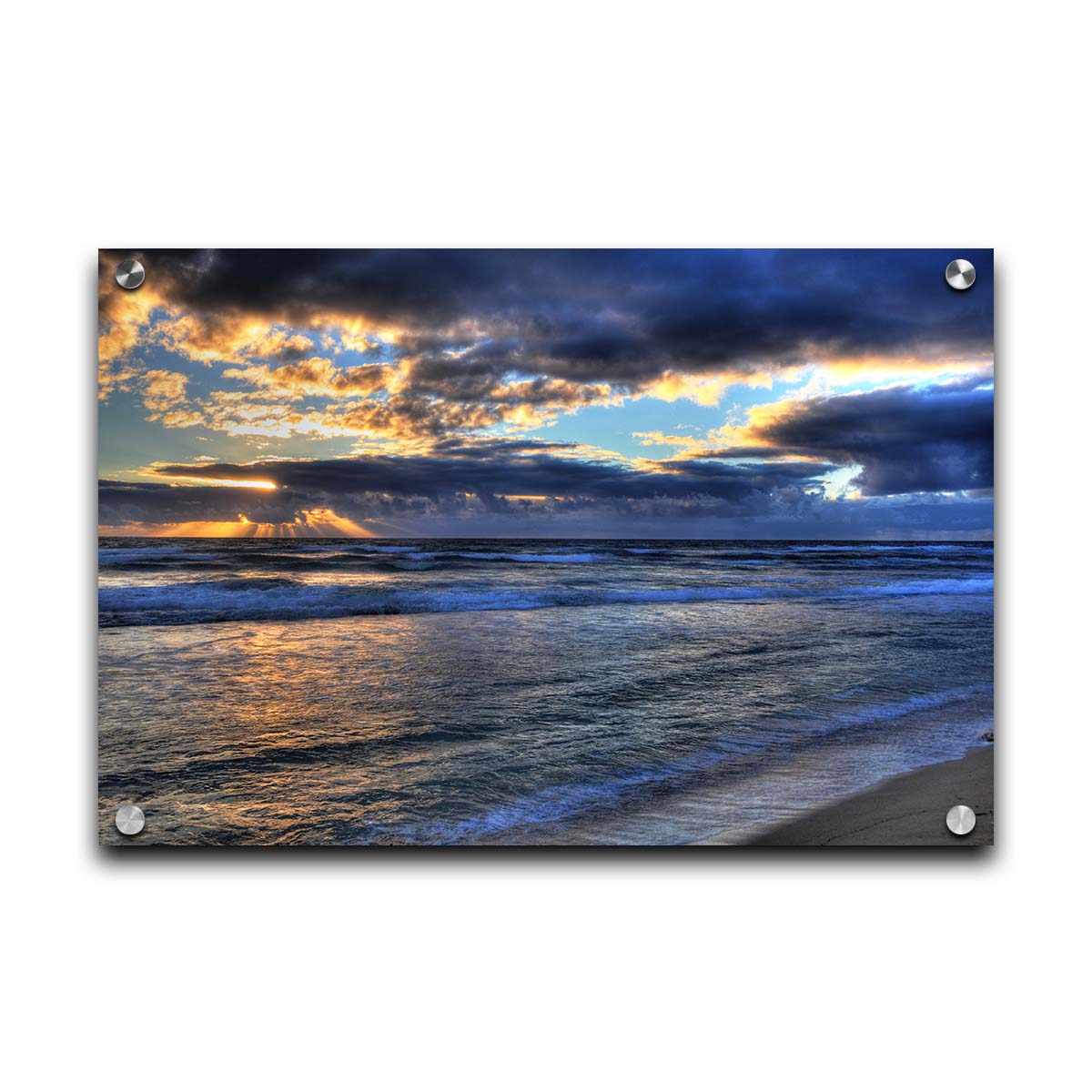 A photo looking out to sea off the coast of Kauaʻi at sunrise. The sunlight reflects off the sea and clouds in a beautiful parallel. Printed on acrylic.