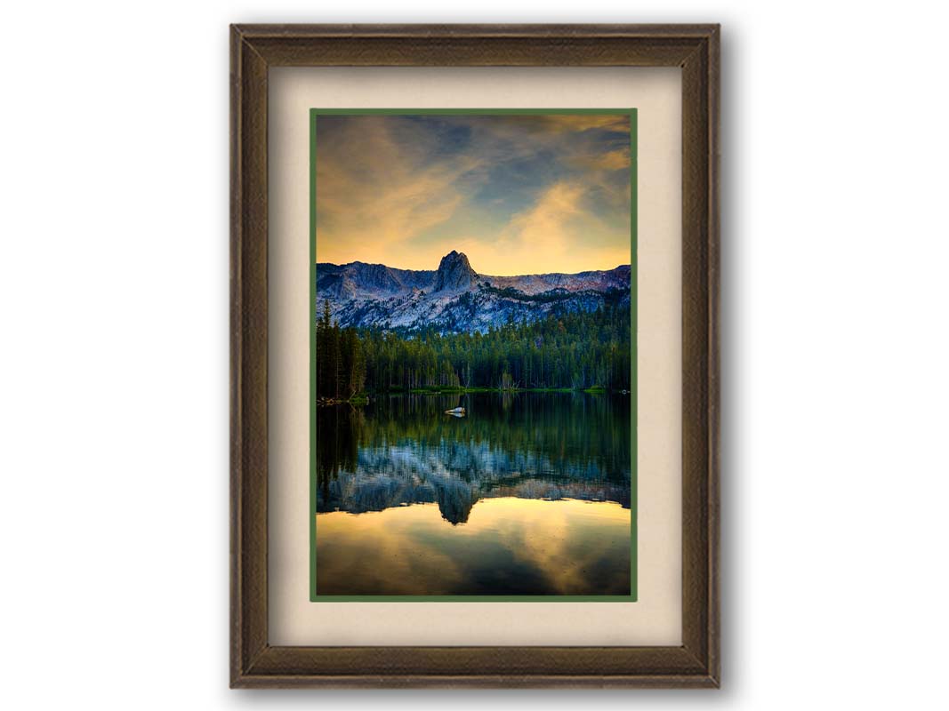 A photo overlooking Lake Mamie, one of the Mammoth Lakes at Mammoth Mountain in California. Printed on paper, matted, and framed.