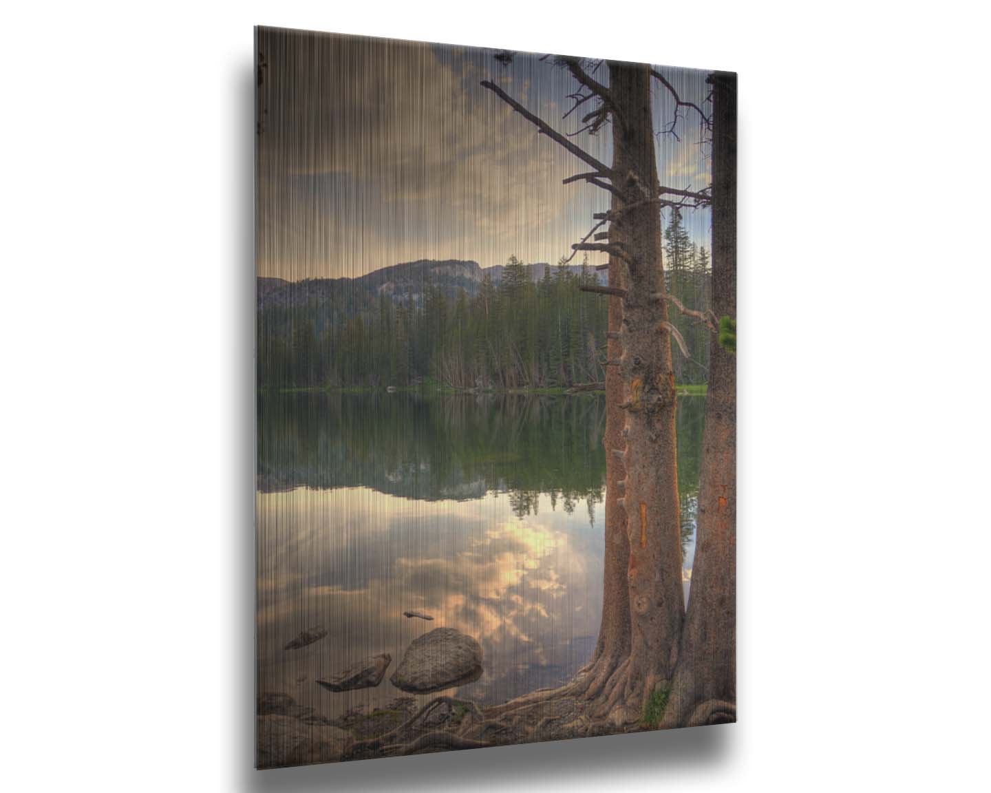 A photo overlooking Lake Mamie at Mammoth Mountain, California. The lake is surrounded by a forest of trees, with the mountains in the background. Printed on metal.