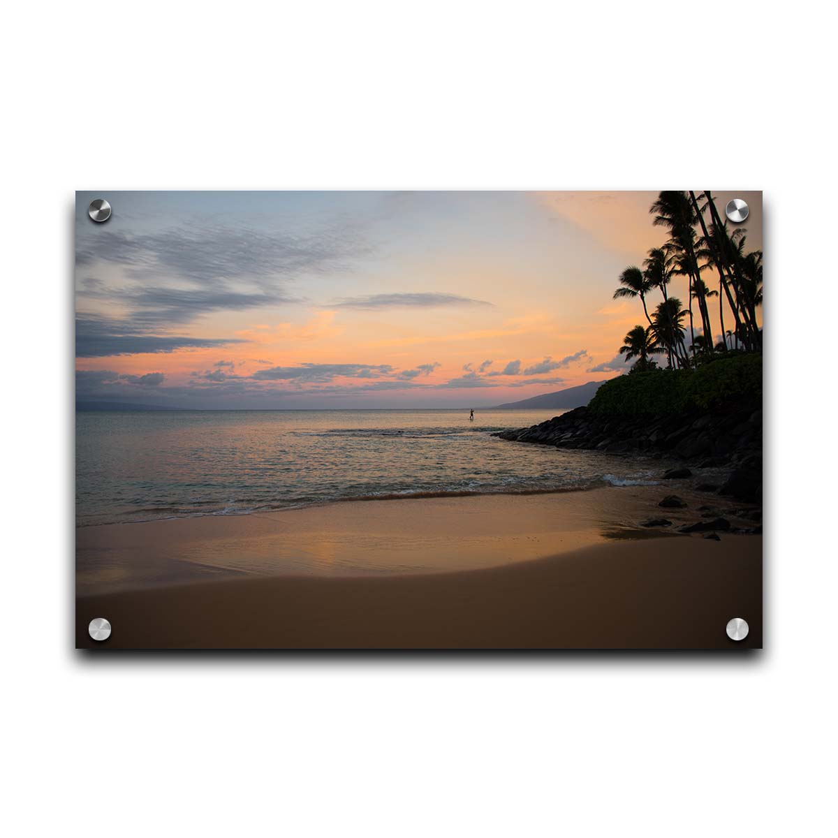 A photo looking out to sea at Maui during sunrise. A surfer can be seen on the water in the distance. Printed on acrylic.