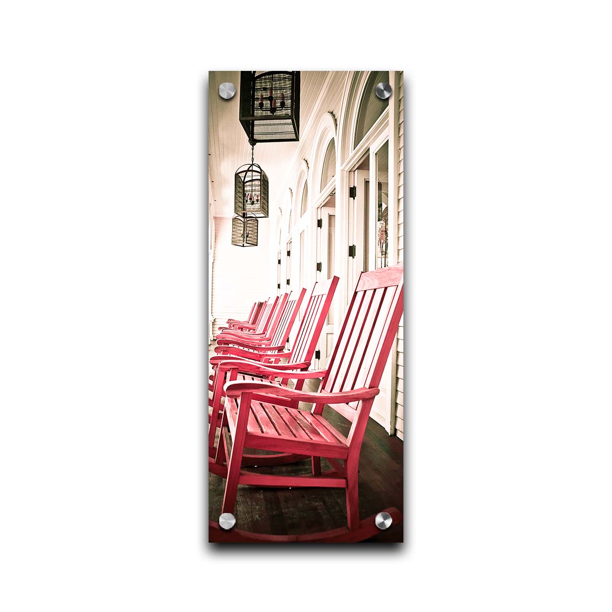 A photo looking down a row of rocking chairs on a porch in O'ahu, Hawaiʻi. Printed on acrylic.