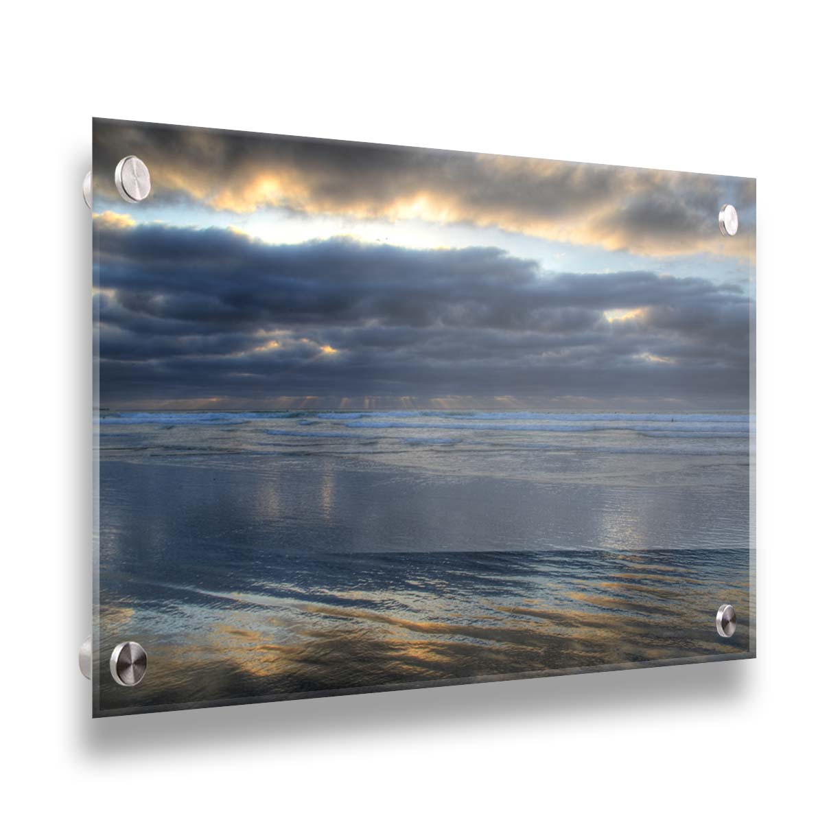 A photo of the sea at La Jolla as viewed near the Ellen Browning Scripps Memorial Research Pier. Rays of light can be seen shining down onto the sea from the cloudy sky. Printed on acrylic.