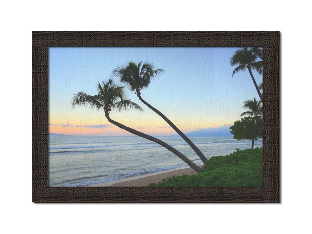 A photo of palm trees silhouetted against the sunrise sky of Hawaiʻi. Printed on canvas and framed.