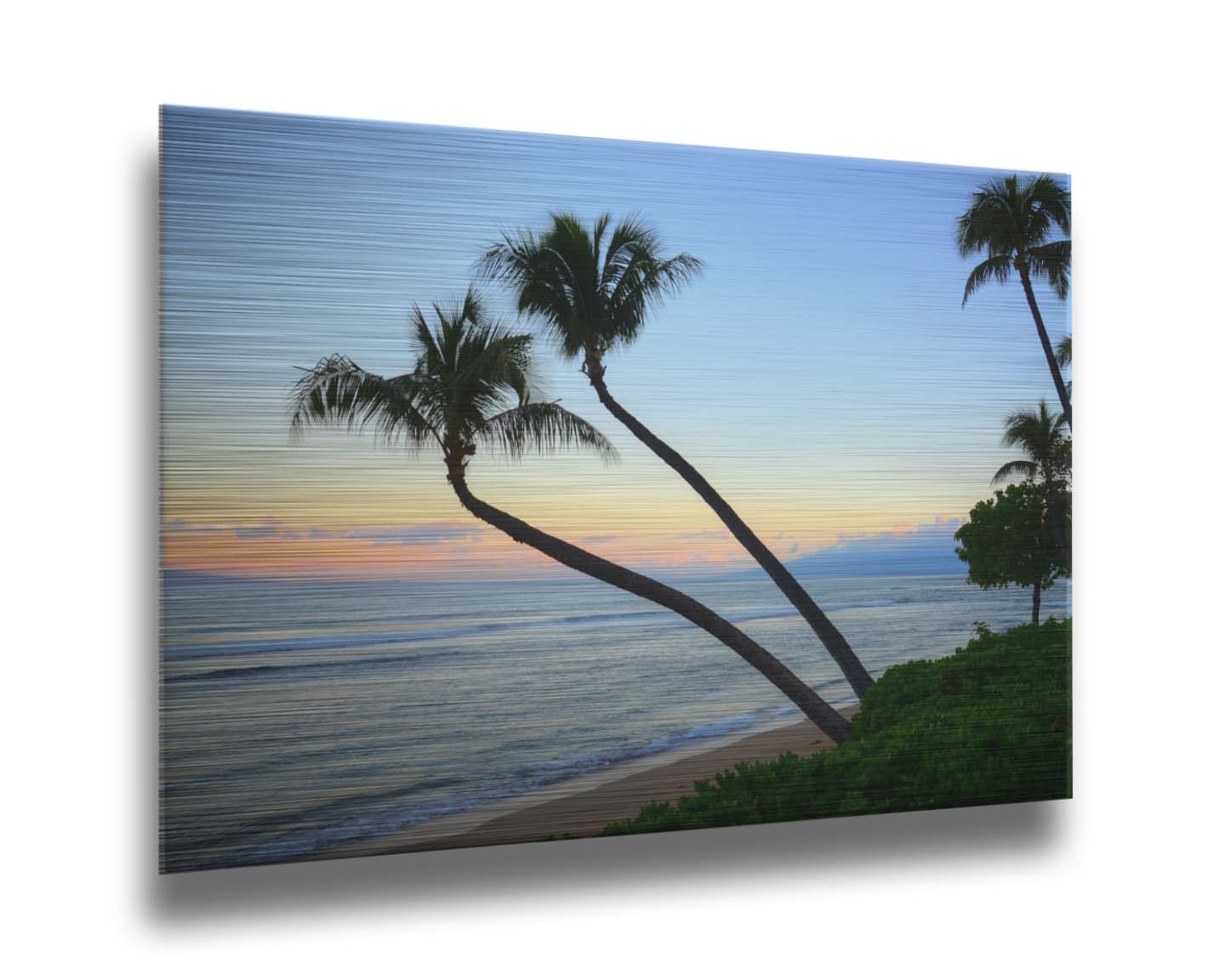 A photo of palm trees silhouetted against the sunrise sky of Hawaiʻi. Printed on metal.