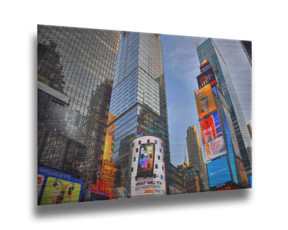 A photo looking up at the buildings and advertisements of Times Square in New York. Printed on metal.