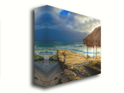 A photo of the palapa at Windansea beach, sitting on a rock in  the fading sunshine. Printed on canvas.