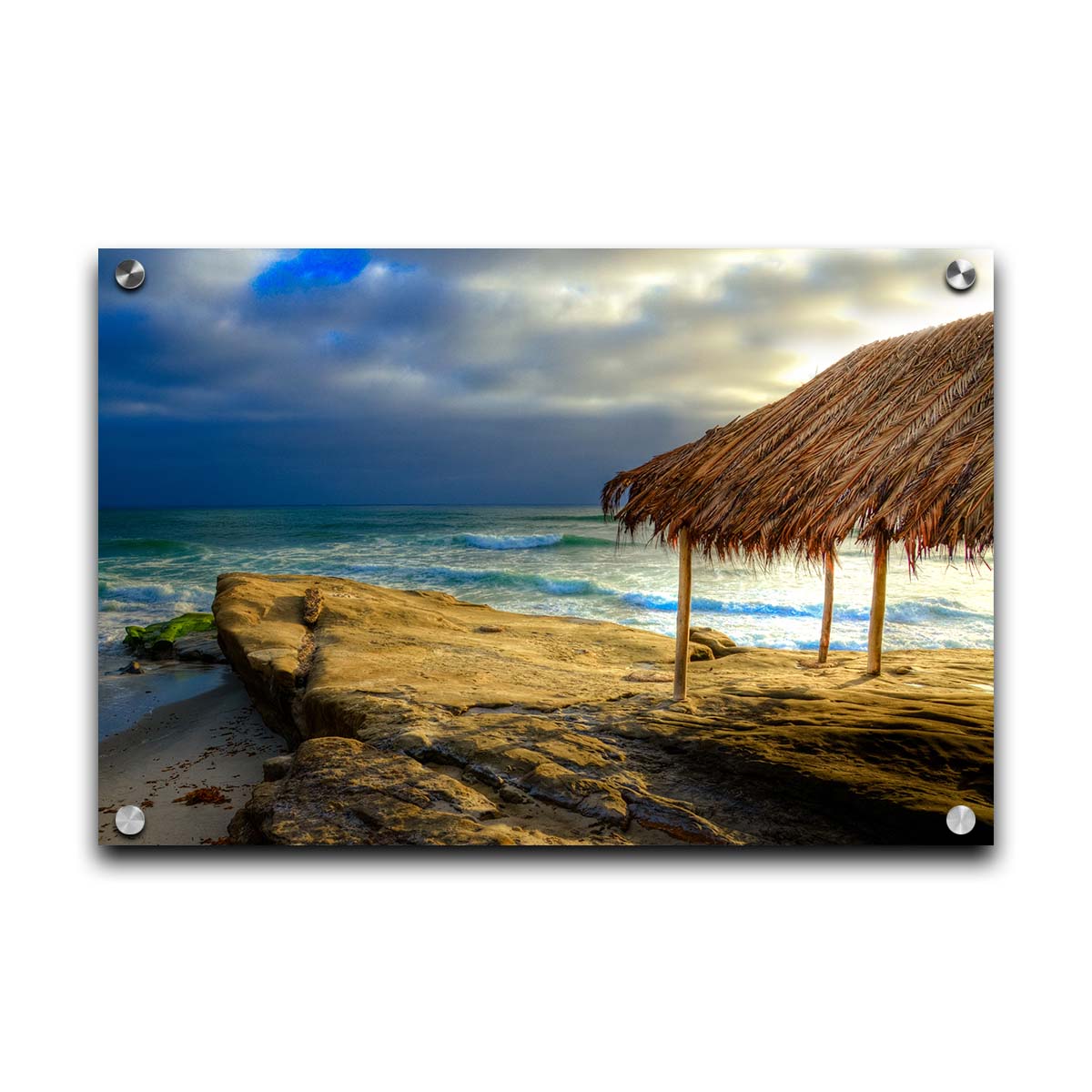 A photo of the palapa at Windansea beach, sitting on a rock in  the fading sunshine. Printed on acrylic.