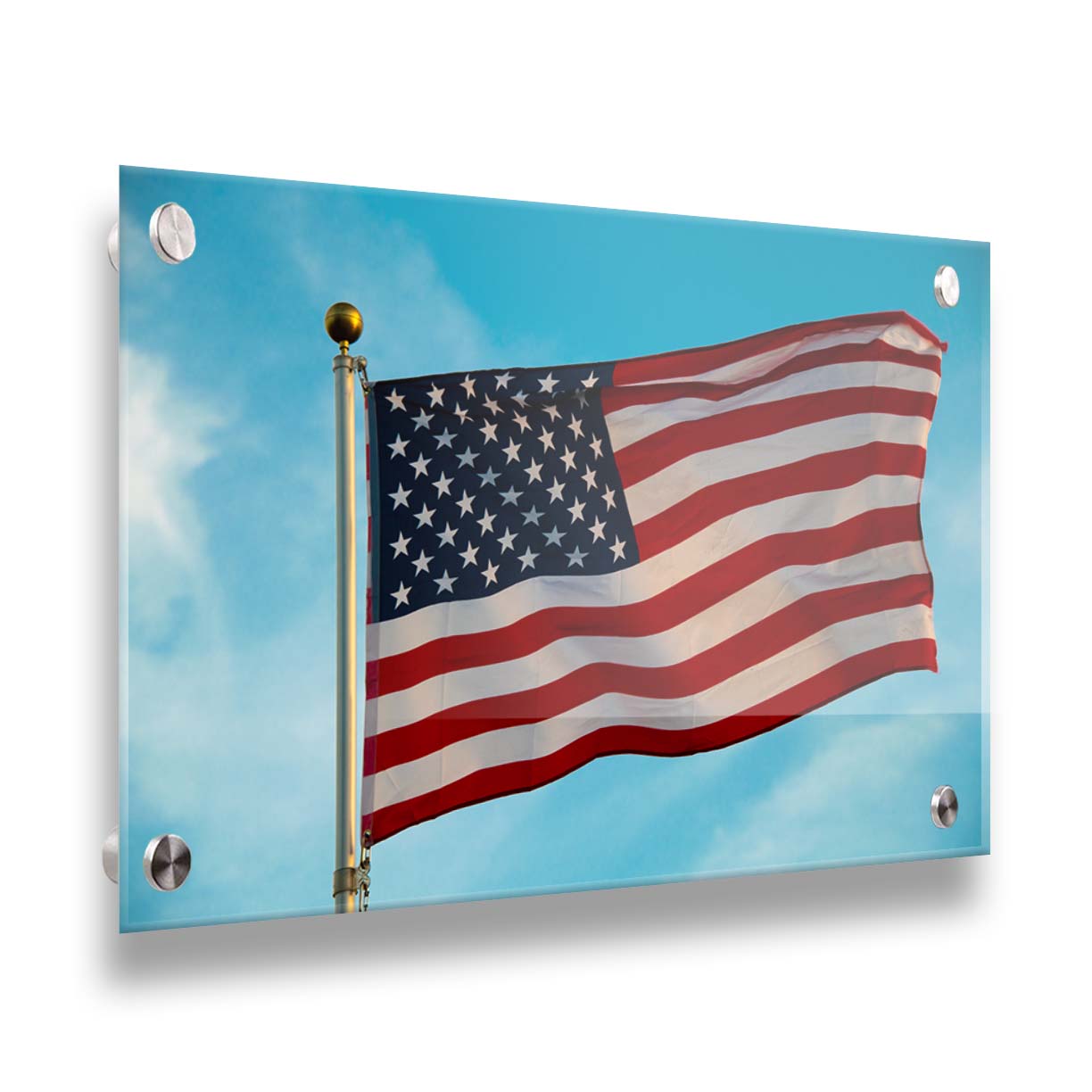 A photo of an American flag agsinst a bright blue sky. Printed on acrylic.