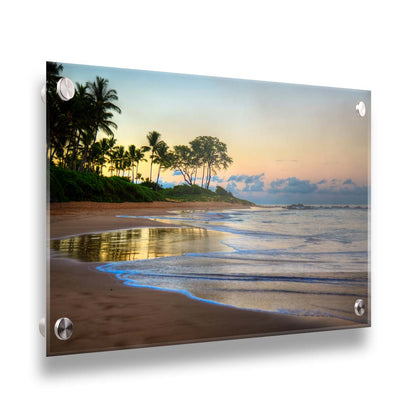 A photo of Keawakapu Beach at sunrise, with palms and mountains in the distance. Printed on acrylic.