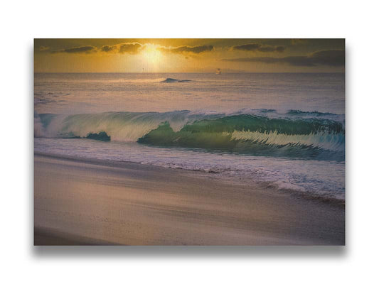 A photo of a calm sea wave rolling onto the beach on Maui at sunset. A boat can be seen on the water in the distance. Printed on canvas.