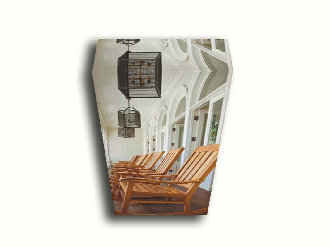 A photo looking down a row of rocking chairs on a porch in O'ahu, Hawaiʻi. Printed on canvas.