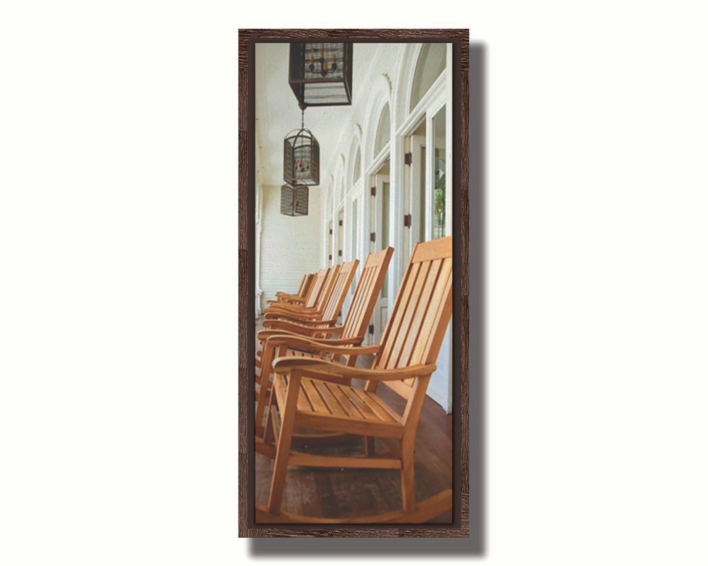 A photo looking down a row of rocking chairs on a porch in O'ahu, Hawaiʻi. Printed on canvas in a float frame.