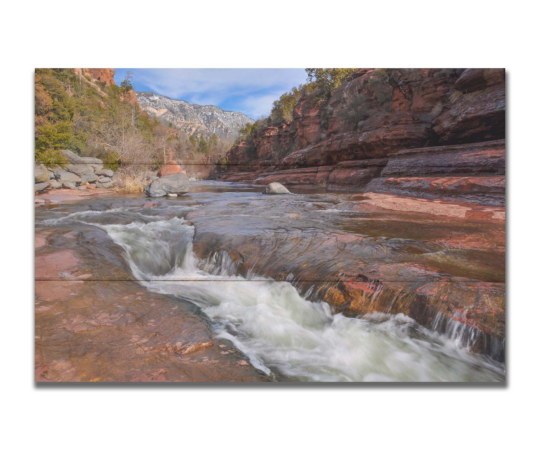 A photo of Slide Rock State Park in Sedona, Arizona, focusing on the iconic Oak Creek "natural waterslide." Printed on a box board.