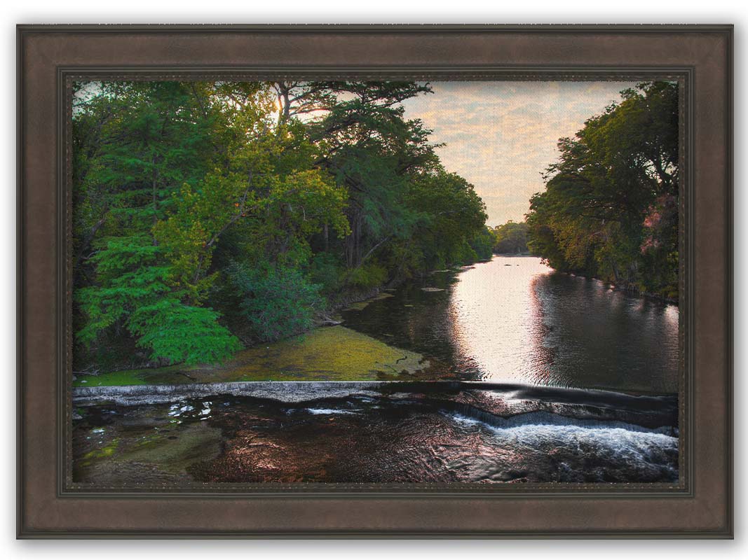 A photograph of the Comal River in New Braunfels, Texas. Printed on canvas and framed.