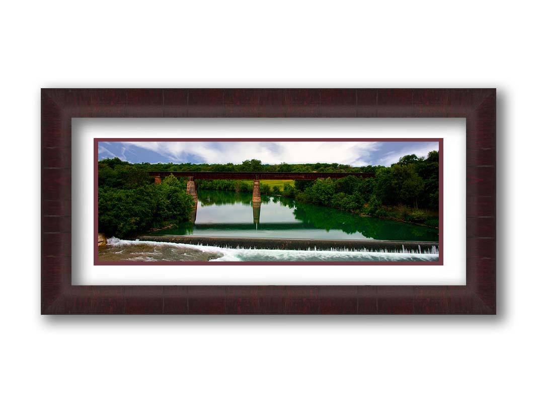 A panoramic photograph of the Faust Street Bridge in Texas, one of the largest remaining 19th century bridges by the King Bridge Company. Printed on paper, matted, and framed.