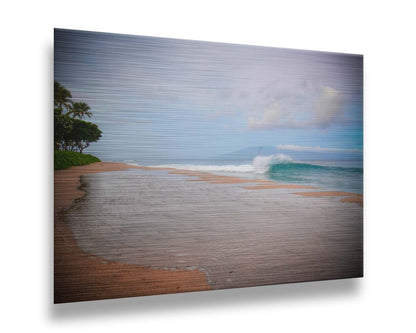 A refreshing photograph of Hawai'i's Ka'anapali beach, with cool blue waves rolling onto shore and mountains in the distance. Printed on metal.