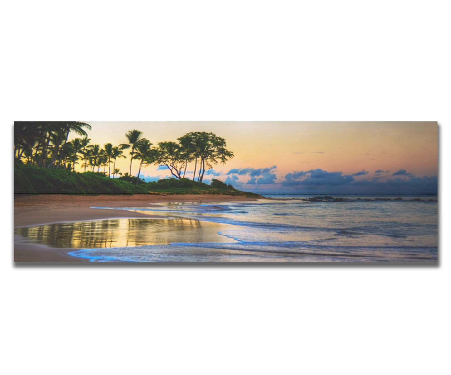 A photo of Keawakapu Beach at sunrise, with palms and mountains in the distance. Printed on a box board.