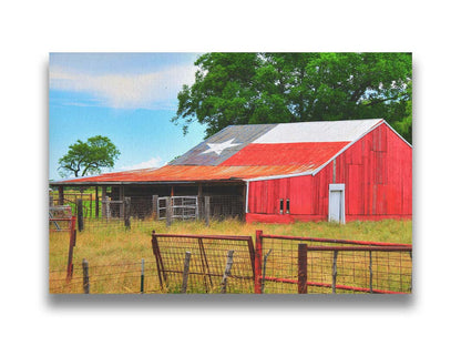 A photograph of a red barn, with a Texas flag painted on the roof. It is surrounded by red ranch fences and grassy fields. Printed on canvas.