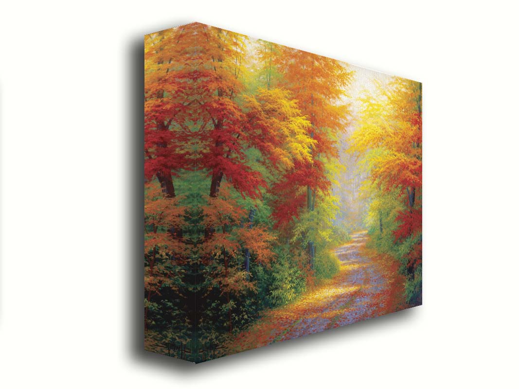 A painting of a road winding through a forest during fall. The green, yellow, red, and orange foliage and trees shed leaves that line the path. Printed on canvas.