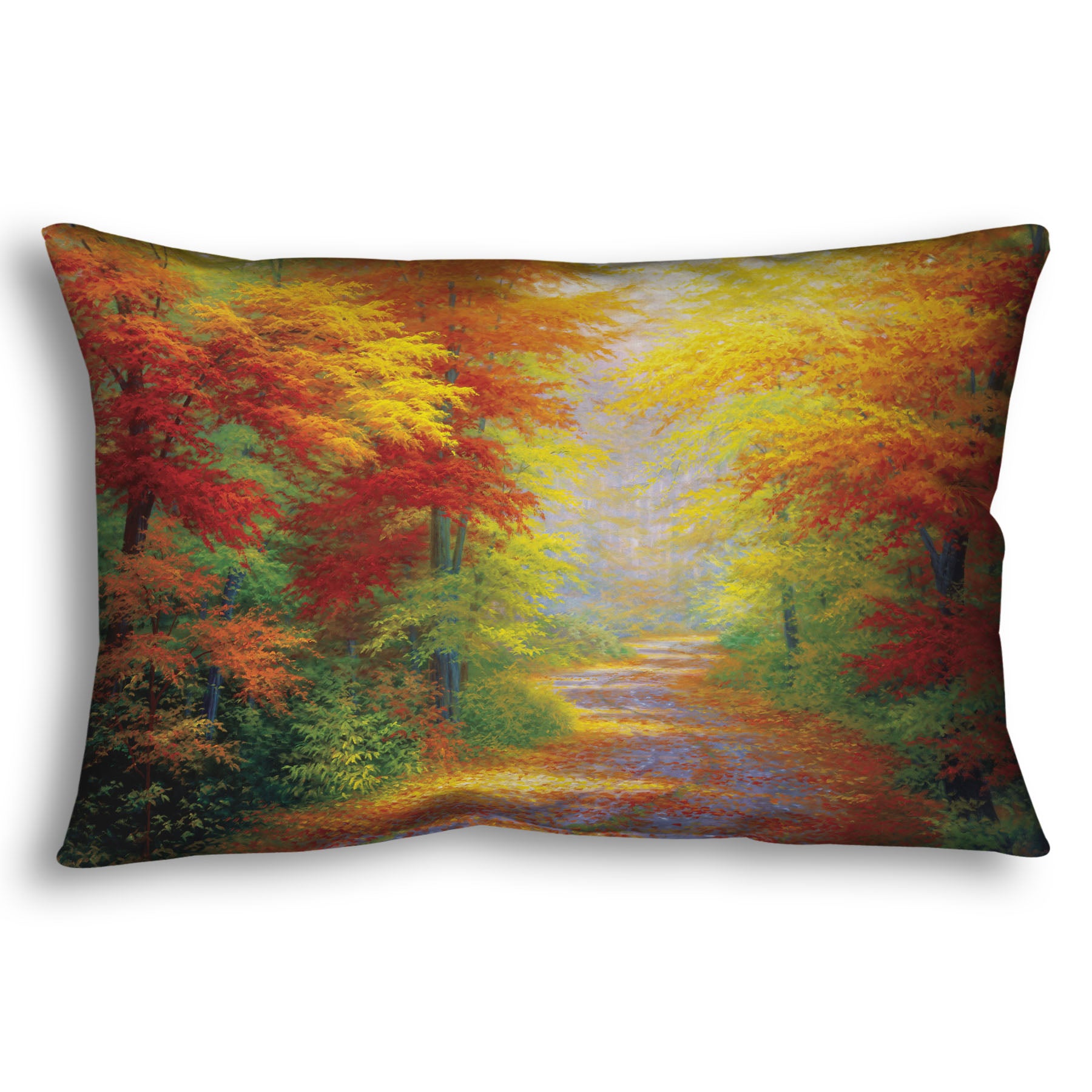 A throw pillow designed with a painting of a road winding through a forest during fall. The green, yellow, red, and orange foliage and trees shed leaves that line the path.