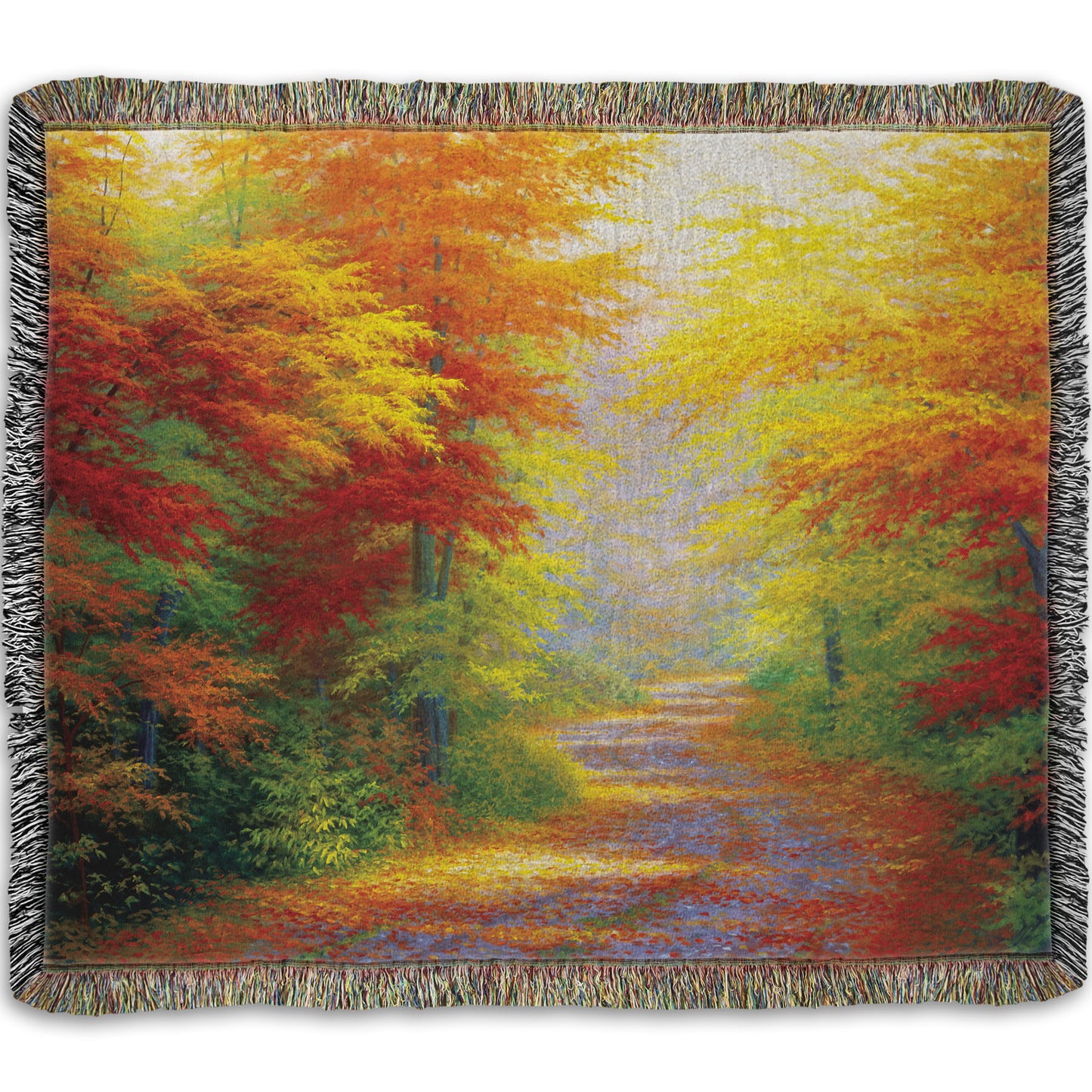 A woven throw blanket designed with a painting of a road winding through a forest during fall. The green, yellow, red, and orange foliage and trees shed leaves that line the path.