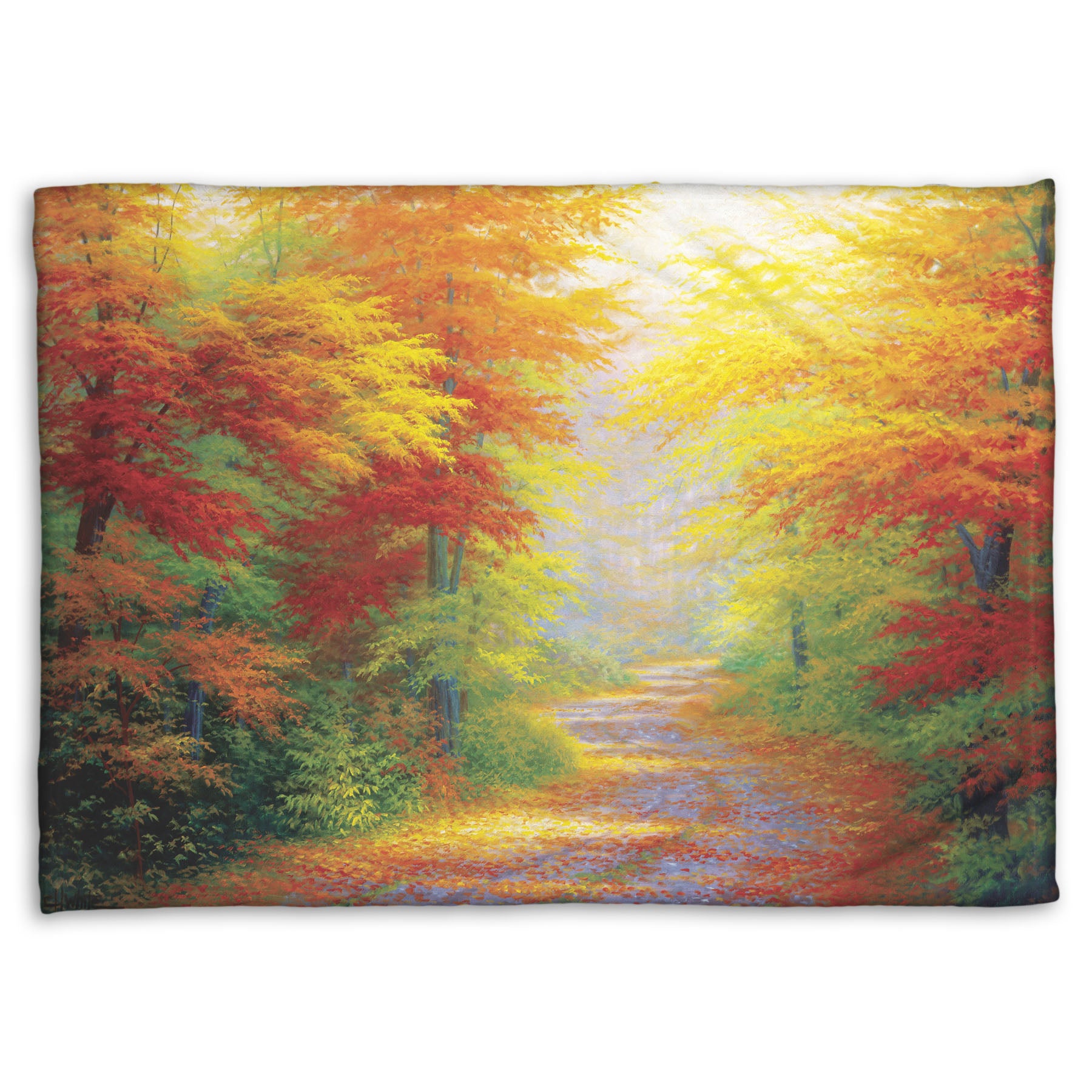 A coral fleece throw blanket designed with a painting of a road winding through a forest during fall. The green, yellow, red, and orange foliage and trees shed leaves that line the path.