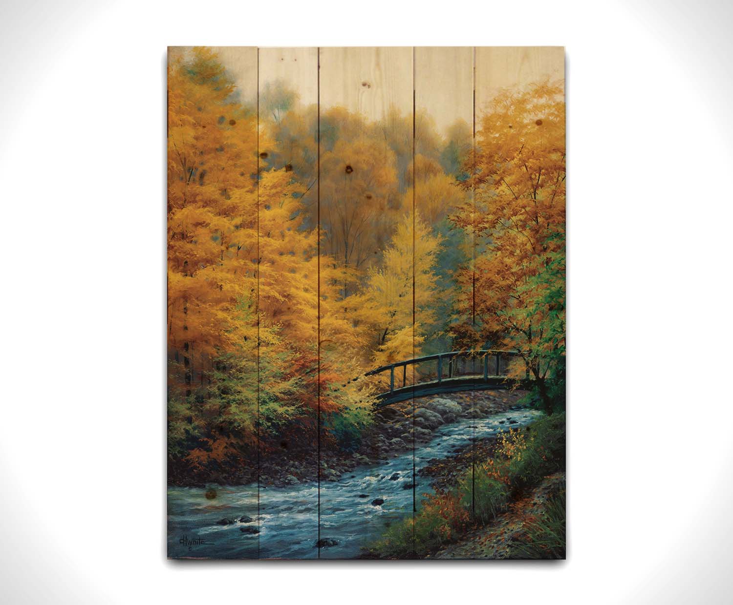 A painting of a forest stream, passing under an arched bridge. The trees are changing to yellow and orange for the fall season. Printed on a wood pallet.