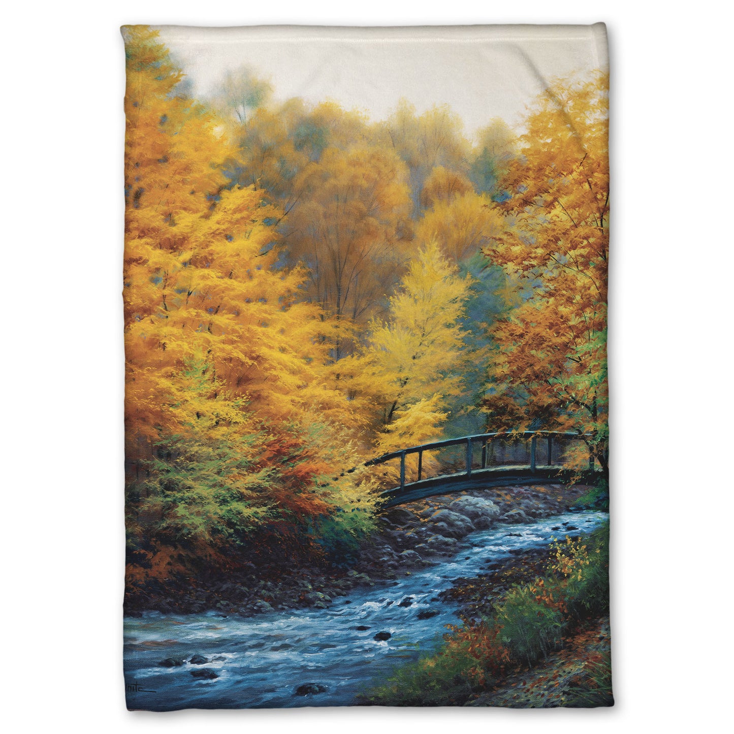 Coral fleece blanket designed with a painting of a forest stream, passing under an arched bridge. The trees are changing to yellow and orange for fall.