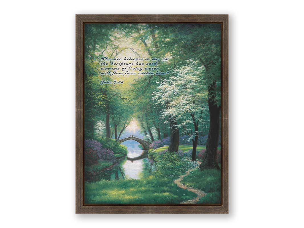 A painting of a stream through a lush green forest trail, with a bridge crossing in the distance. Printed on canvas and framed.