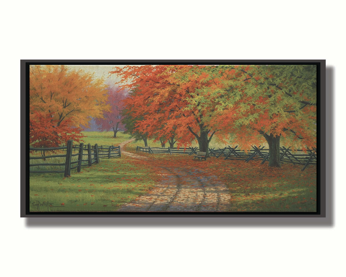 A painting of a road winding through a fenched field, surrounded by multicolor fall maple trees. Printed on canvas in a float frame.