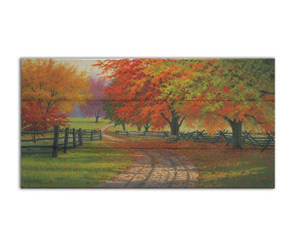 A painting of a road winding through a fenched field, surrounded by multicolor fall maple trees. Printed on a box board.