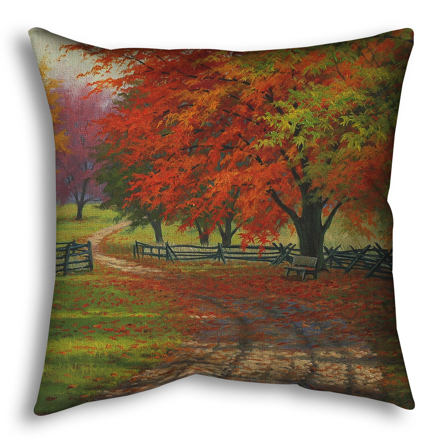A throw pillow designed with a painting of a road winding through a fenced field, surrounded by multicolored fall maple trees.