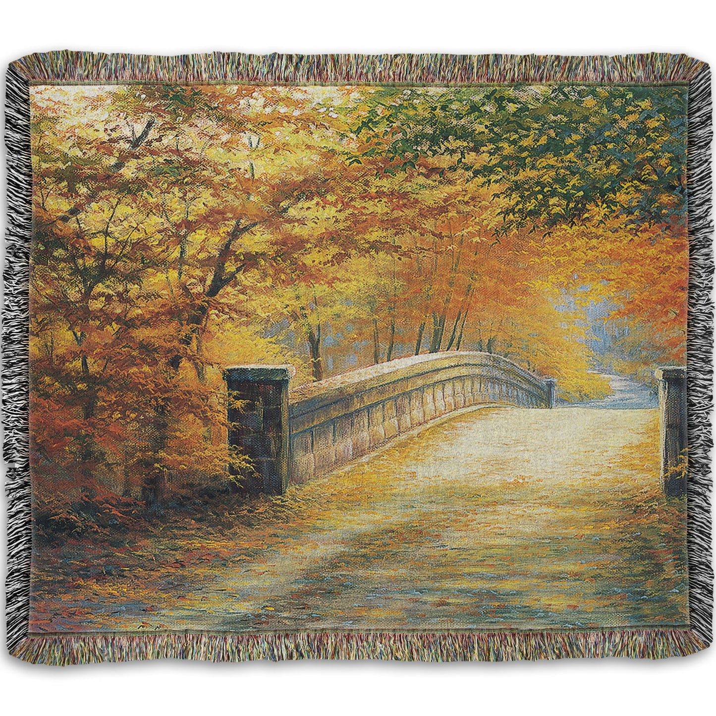 A woven throw blanket designed with a painting looking down a bridge road during fall. The trees lining the road have turned yellow and orange for autumn, and some of their fallen leaves are scatted along the path.