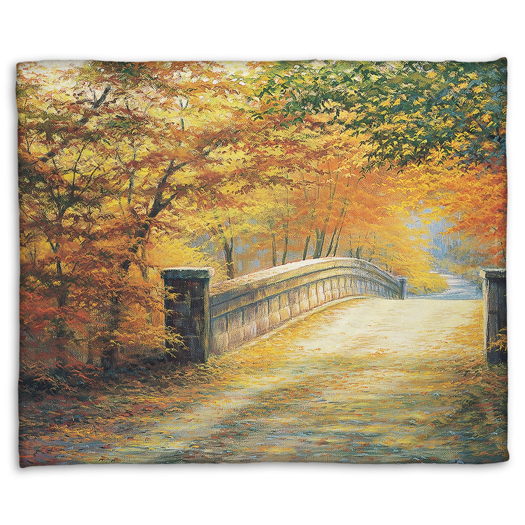 A fleece blanket designed with a painting looking down a bridge road during fall. The trees lining the road have turned yellow and orange for autumn, and some of their fallen leaves are scatted along the path.