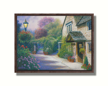 A painting of a bed and breakfast storefront, with a streetlamp-lined path leading to the garden full of blooming flowers. Printed on canvas in a float frame.